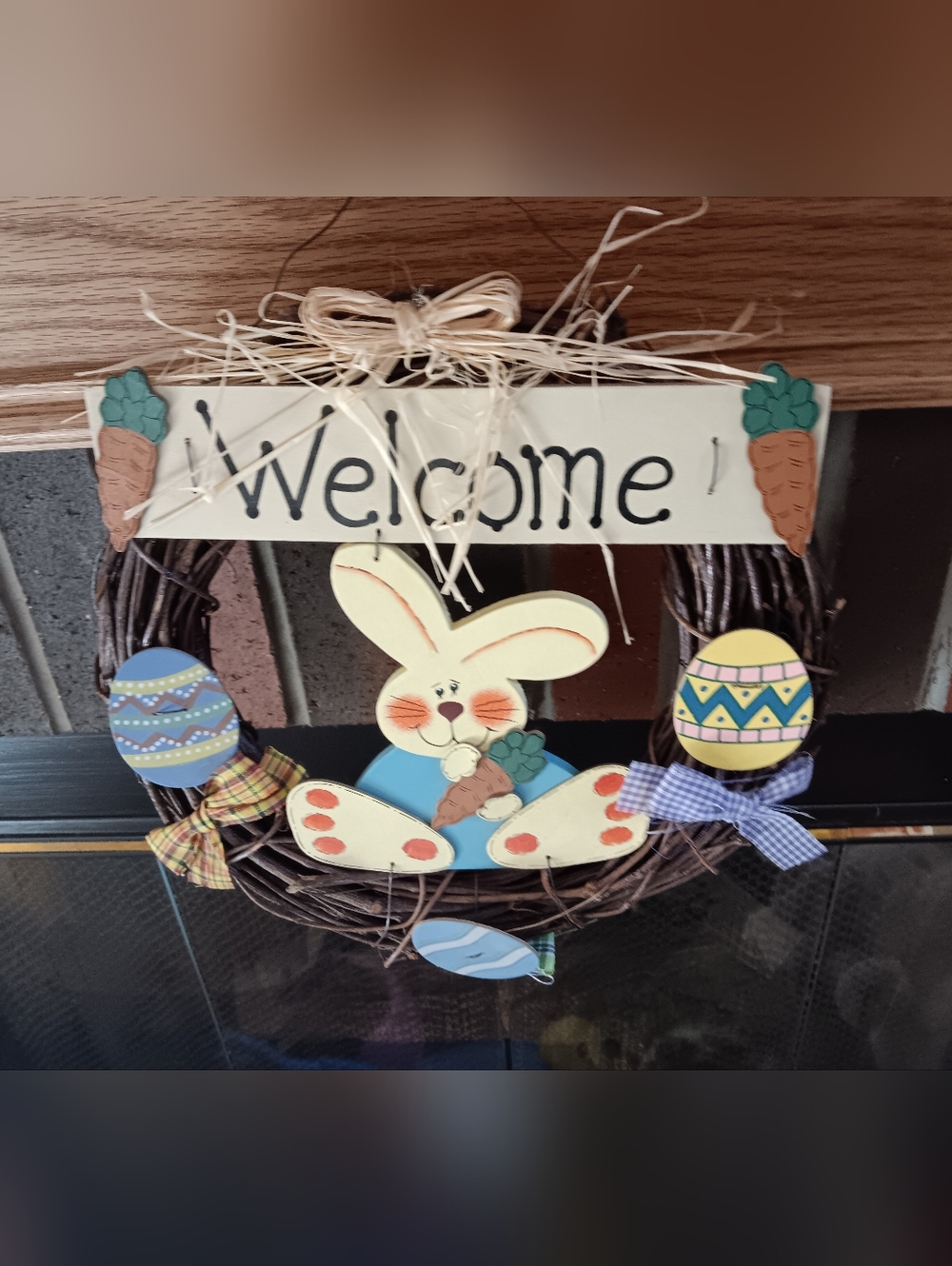 Unk Welcome Bunny Easter Wreath in Pastel Blue, Yellow, Pink, Brown